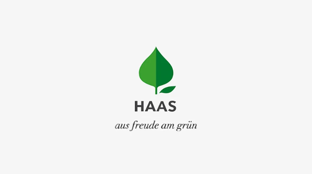Logo mit grünem Blatt, "HAAS" Schriftzug und Slogan "aus freude am grün", naturverbunden und modern.